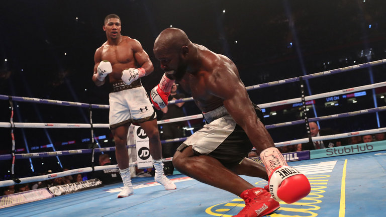 Joshua ovecomes Takam in the tenth round via stoppage