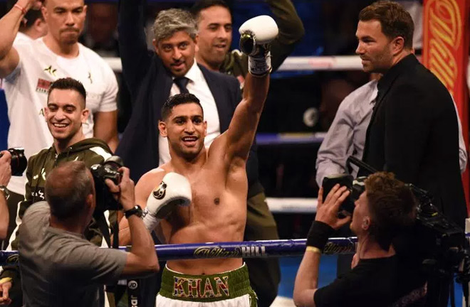 Amir Khan produced a boxing class on Saturday night. Photo Credit: The Sun