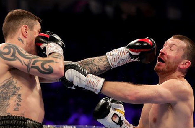 Ricky Burns floored Scotty Cardle in the third round.