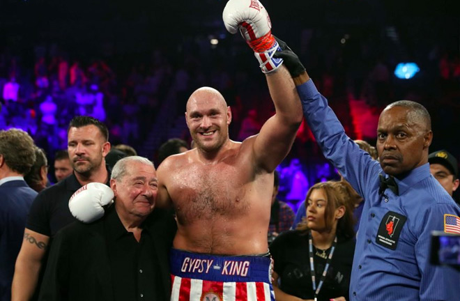 Tyson Fury with Bob Arum after being announced as the winner of the tie.