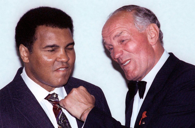 Muhammad Ali and Henry Cooper. Photo credit: nytimes.com
