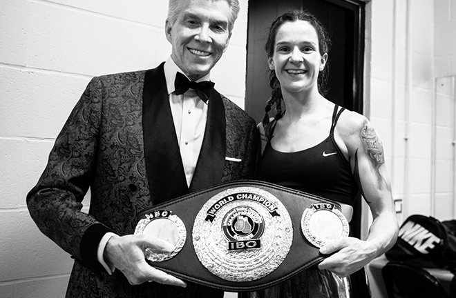 Unbeaten Terri Harper poses with Michael Buffer after defending her IBO Super Featherweight crown Credit: Matchroom Boxing