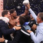 Joshua was joined by promoter Eddie Hearn as he celebrated his rematch win over Ruiz Jr in Saudi Arabia Photo Credit: Mark Robinson/Matchroom Boxing