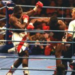 Lewis stopped British rival Frank Bruno in their WBC heavyweight title clash in Cardiff in 1993 Photo Credit: The Telegraph