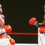 Larry Holmes taking on former sparring partner, Muhammad Ali. Photo Credit: Sports Illustrated.