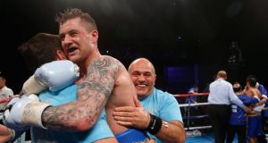 Ricky Burns celebrating a win with Tony and Peter Sims. Photo Credit: Glasgow Live