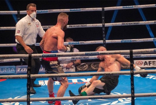 Lewis Crocker dropping Louis Greene en route to a stoppage victory. Photo Credit: Scott Rawsthorne/MTK Global