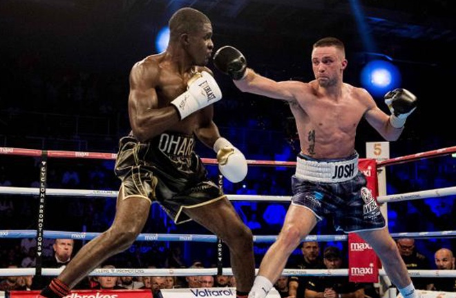 Taylor on route to victory over Ohara Davies in 2017 Photo Credit: SNS