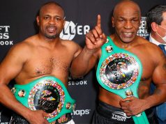 Mike Tyson vs Roy Jones Jr ended in a draw. Both men posed after the bout with their belts following their split draw decision. CREDIT: USA TODAY SPORTS