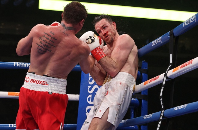 Smith battled to the final bell despite a punishing Canelo display Photo Credit: Ed Mulholland/Matchroom Boxing