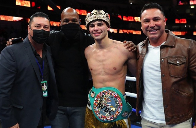 Garcia celebrates alongside Golden Boy promoters Bernard Hopkins and Oscar De La Hoya Photo Credit: Tom Hogan-Hogan Photos/Golden Boy