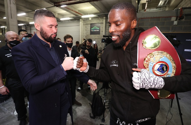 Okolie embraces with former Cruiserweight world champion Tony Bellew Photo Credit: Mark Robinson/Matchroom Boxing