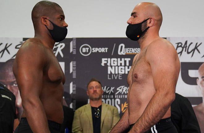 Dubois and Dinu faced off at Friday's weigh in ahead of their WBA Interim Heavyweight title clash Photo Credit: Round 'N' Bout Media/Queensberry Promotions