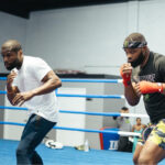 Woodley posted a picture on social media of him training alongside Floyd Mayweather Jr Photo Credit: @TWooodley Twitter