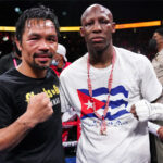 Yordenis Ugas and Manny Pacquiao embraced after their fight in Las Vegas on Saturday night Photo Credit: Sean Michael Ham/TGB Promotions