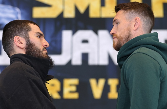 Beterbiev and Smith face-to-face at Thursday's press conference Photo Credit: Mikey Williams/Top Rank via Getty Images