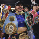 Estrada celebrates after being crowned undisputed champion Photo Credit: Mikey Williams/Top Rank