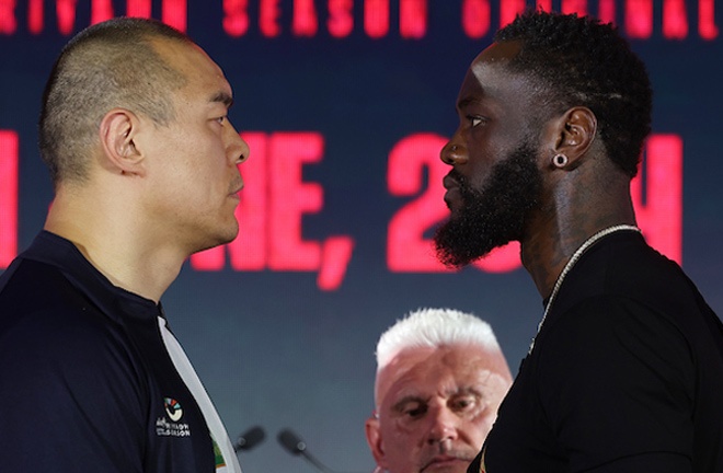 Wilder and Zhang face to face at Thursday's press conference.  Photo: Mark Robinson/Matchroom Boxing