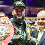 Beterbiev celebrates after beating Bivol to become undisputed champion Photo Credit: Leigh Dawney/Queensberry Promotions