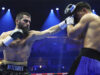 Artur Beterbiev edged past Dmitry Bivol to become the undisputed light heavyweight champion in Riyadh on Saturday Photo Credit: Mikey Williams/Top Rank