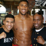 Joshua alongside Nigel Benn (R) and Conor Benn (L)