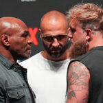 Paul and Tyson came face-to-face at Wednesday’s press conference Photo Credit: AP Photo/Julio Cortez