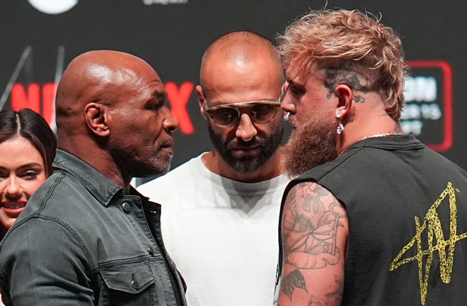 Paul and Tyson came face to face at Wednesday's press conference. Photo: AP Photo/Julio Cortez