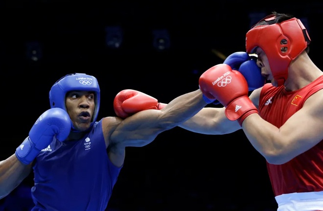 Joshua beat Zhang at the 2012 Olympics Photo Credit: AP: Associated Press