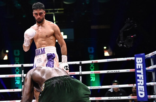 Azim stopped Davies in October Photo Credit: Lawrence Lustig/BOXXER