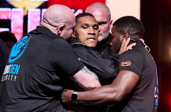 Benn was held back by security after Eubank Jr slammed an egg in his face Photo Credit: Mark Robinson Matchroom Boxing