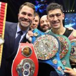 Bivol celebrates with promoter Eddie Hearn after becoming undisputed champion Photo Credit: Mark Robinson Matchroom Boxing