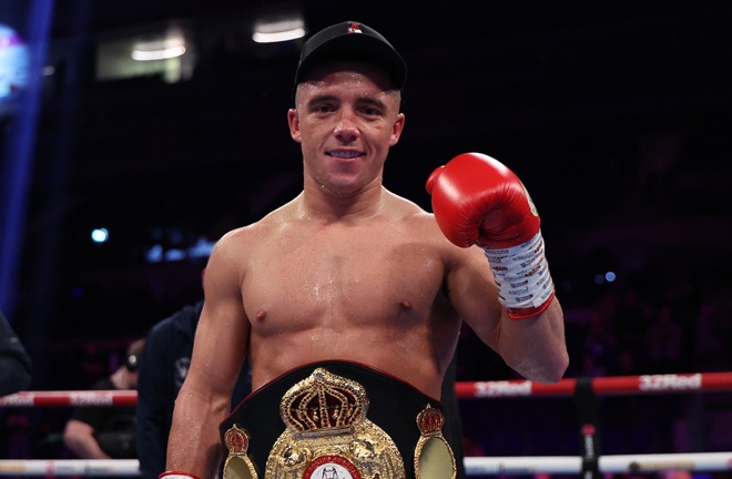 Ball celebrates after retaining his WBA featherweight world title Photo Credit: Leigh Dawney/Queensberry Promotions