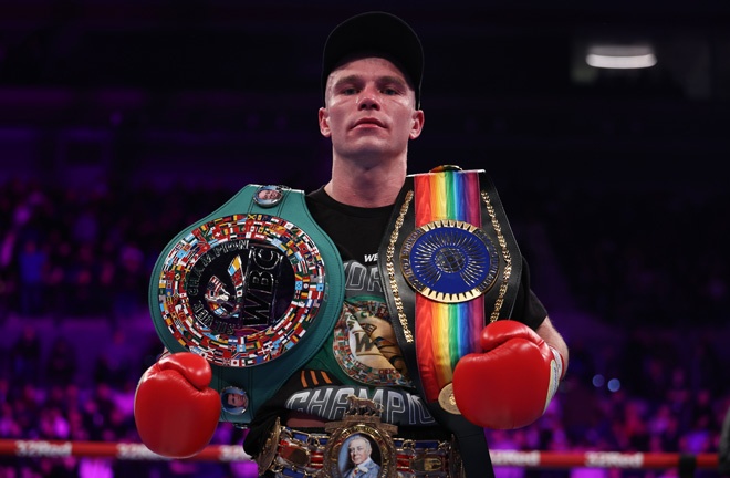 Cain took home three belts after defeating Edwards Photo Credit: Leigh Dawney/Queensberry Promotions